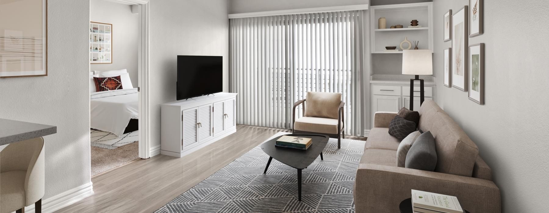 a living room with a couch and a table