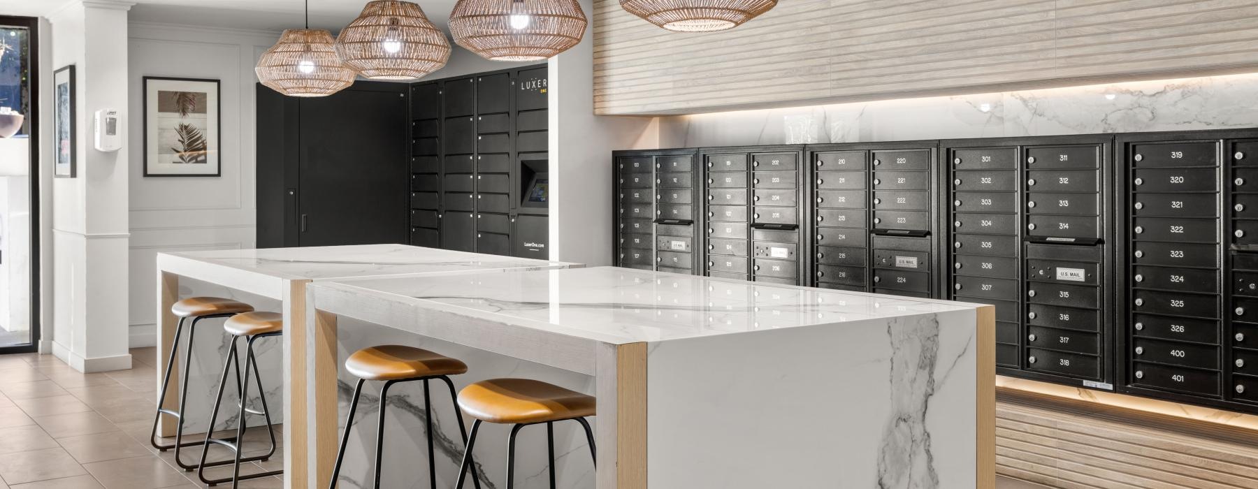 a kitchen with a bar and stools