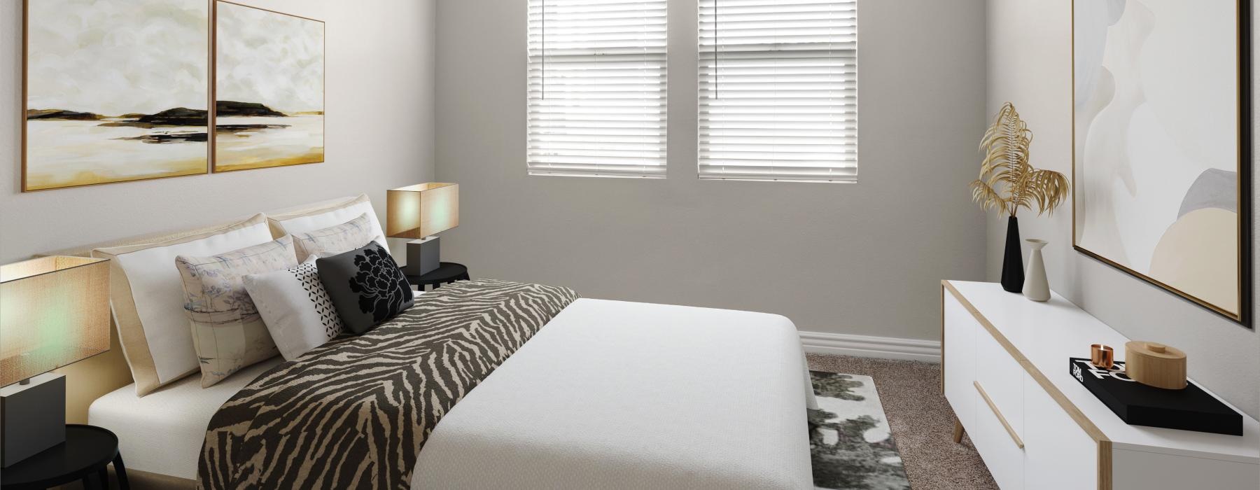 a bedroom with a bed and a mirror