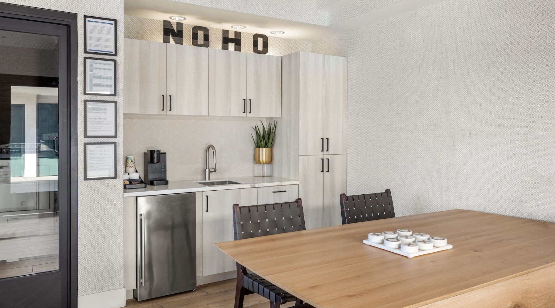 a kitchen with white cabinets